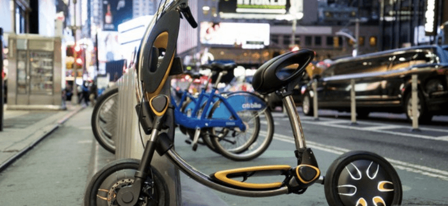 The Inu is a flashy, self-folding electric scooter made for carving through cities