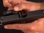 Hold it right there! Zore gun lock alerts owner on tampering | Daily Mail Online